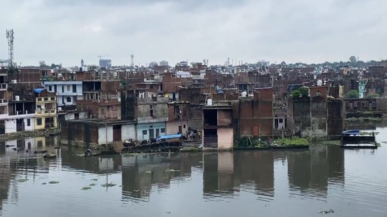 India News | UP: Rising Ganga, Yamuna Water Levels Flood Riverfront Road, Reach Residential Areas in Prayagraj