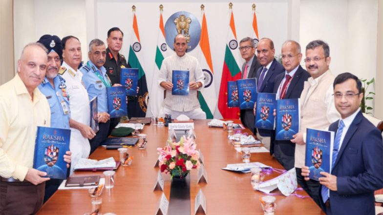 India News | Defence Minister Rajnath Singh Officially Releases Landmark 'RAKSHA' Document on Defence Diplomacy at Kartavya Bhawan