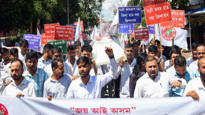 India News | All Assam Students’ Union Stages Protest in Dibrugarh over Rising Prices of Essential Commodities