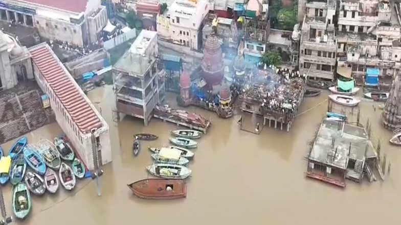India News | Uttar Pradesh: Varanasi DM Satyendra Kumar Inspects Flood Relief Camps, Assures Support to Affected Families