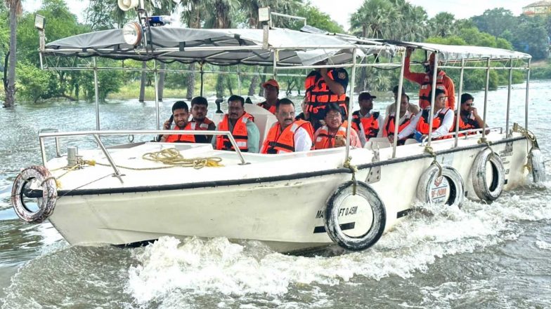 India News | Varanasi Mayor Ashok Tiwari Inspects Flood-hit Areas by Boat, Directs Officials to Ensure Relief for Affected People