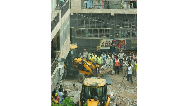 India News | Delhi CM Rekha Gupta Monitors Rescue After Satya Niketan Building Collapse, Orders Action Against Those Responsible