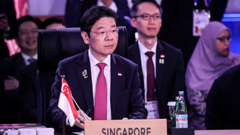 World News | Singapore PM Condemns Anti-Indian Abuse over SIA-AI Investment Deal, Says Prejudice Against Any Community Not Accepted