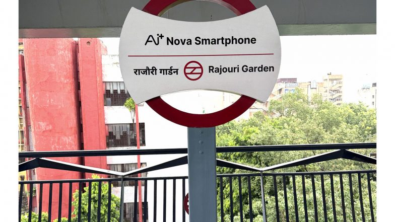 Business News | Ai+ Smartphone Takes Over Rajouri Garden Metro Station in Landmark Delhi Metro Association