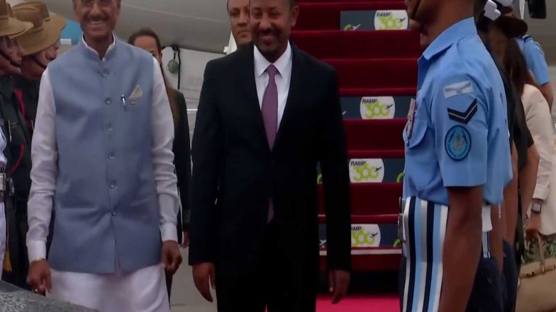 World News | MoS Defence Sanjay Seth Receives Ethiopian PM Aviy Ahmed Ali as He Arrives in India for BRICS Summit