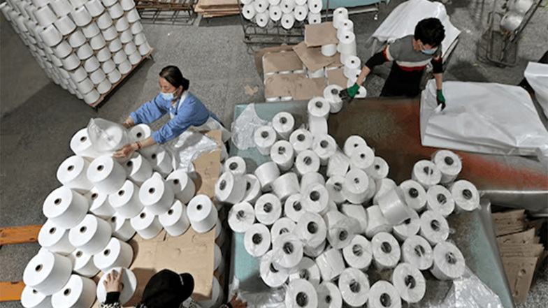 World News | China’s Textile Industry Faces Further Contraction as Nearly 1,500 Firms Exit Official Data Pool
