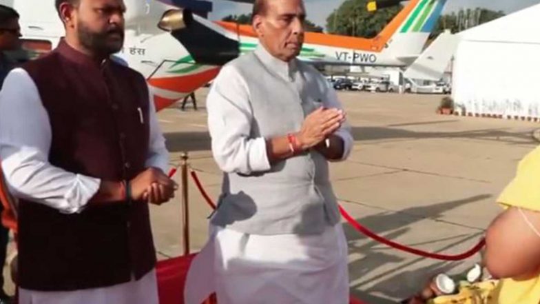 India News | Bengaluru: Rajnath Singh Attends Handover of Tejas Trainers, HTT-40s to IAF, Dhruv NG Helicopters to PHL