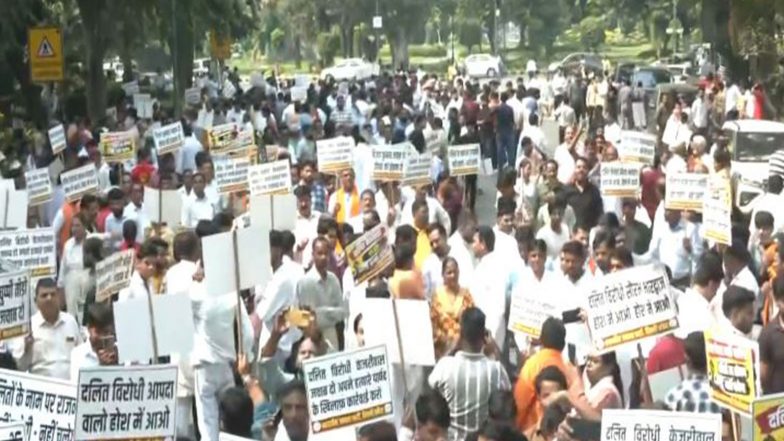 India News | Delhi: BJP Protests Outside AAP Office Demanding Expulsion, Arrest of Councillor Vijay Kumar over MCD Sanitation Worker’s Suicide