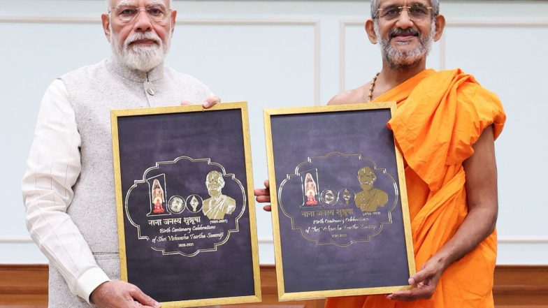 India News | PM Meets Meets Pejavara Seer, Unveils Logo of Birth Centenary Celebrations of Sri Vishwesha Tirtha Swami