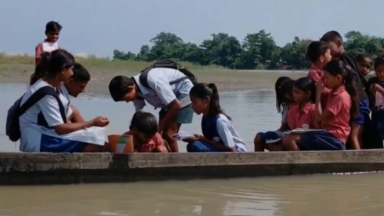 India News | Children Risk River Crossing by Boat Every Day to Reach School in Assam’s Dhemaji