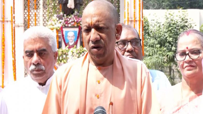 India News | UP CM Yogi Adityanath Pays Floral Tribute to Mahatma Gandhi on 157th Birth Anniversary