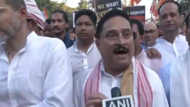 India News | Assam BJP Holds Jan Jagaran Procession in Guwahati Against Congress, INDIA Bloc over SIR