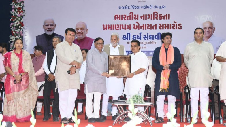 India News | Gujarat Dy CM Harsh Sanghavi Presents Indian Citizenship Certificates to 319 Displaced Persons in Rajkot