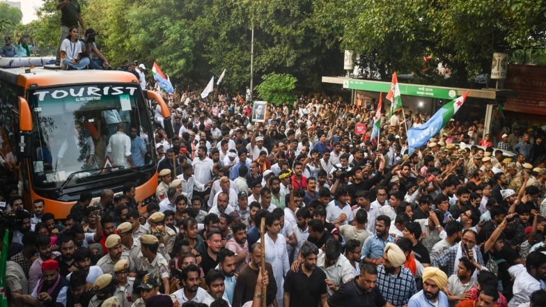India News | BJP Questions Congress over ‘Regime Change’ Claims, Alleged Payments to Protesters