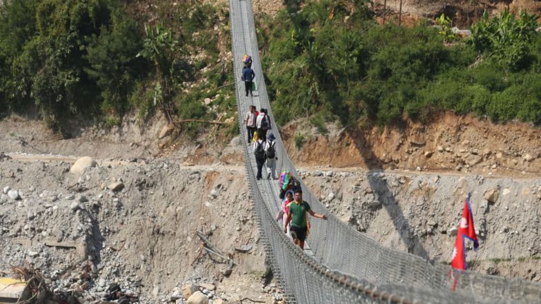 World News | From Precarious Cable to Span: Suspension Bridge Restores Life Flow in Flood-hit Nepal’s Nuwakot