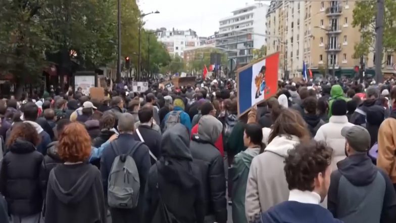 World News | Over 410,000 March Across France over Cost of Living as Police Deploy Water Cannons and Tear Gas in Paris Amid Clashes