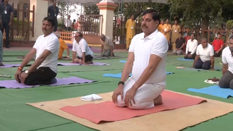 India News | MP CM Mohan Yadav Participates in Yoga Session at Gayatri Dham in Barwani, Praises Anti-drug Efforts