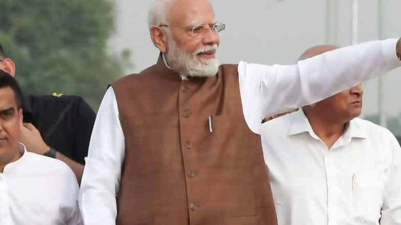 India News |  PM Modi Holds Roadshow in Gujarat's Banaskantha Ahead of Unveiling Projects Worth over Rs 14,000 Crore